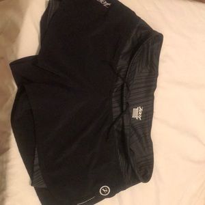 Zoot black exercise shorts with built-in lining.